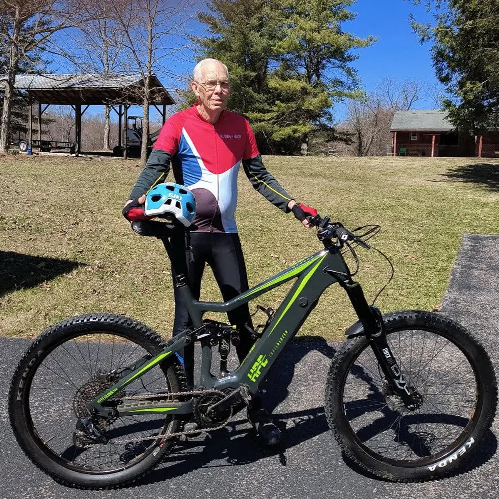 green traiblazer enduro e-bike with older rider